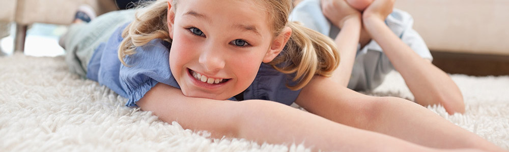 Children playing on clean carpets